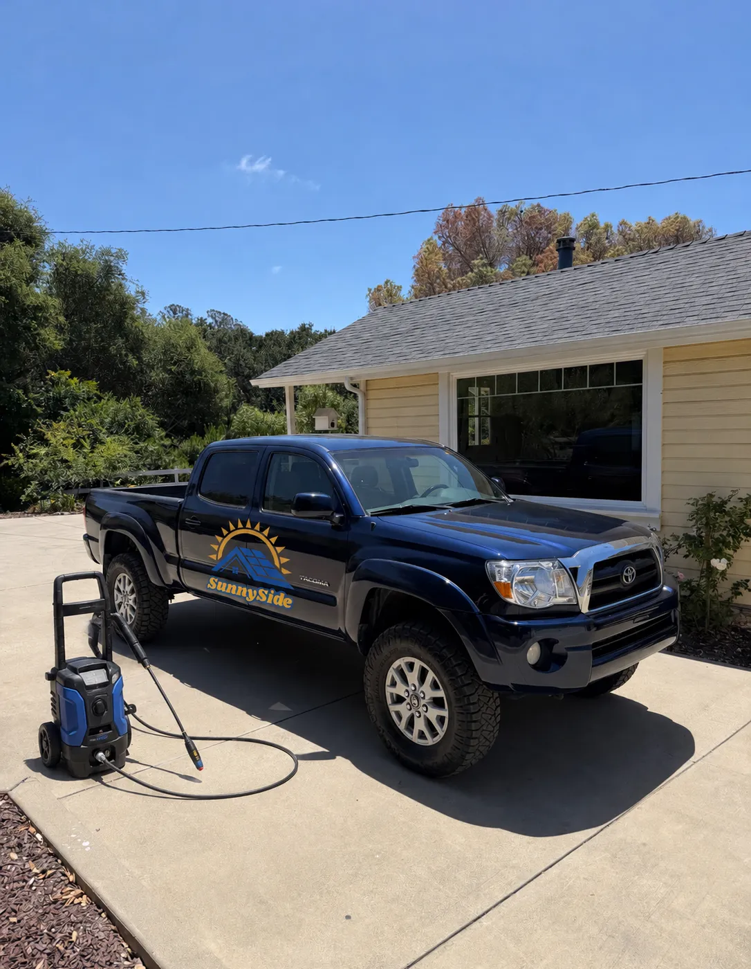 SunnySide Solar Panel Cleaning branded truck with pressure washing equipment